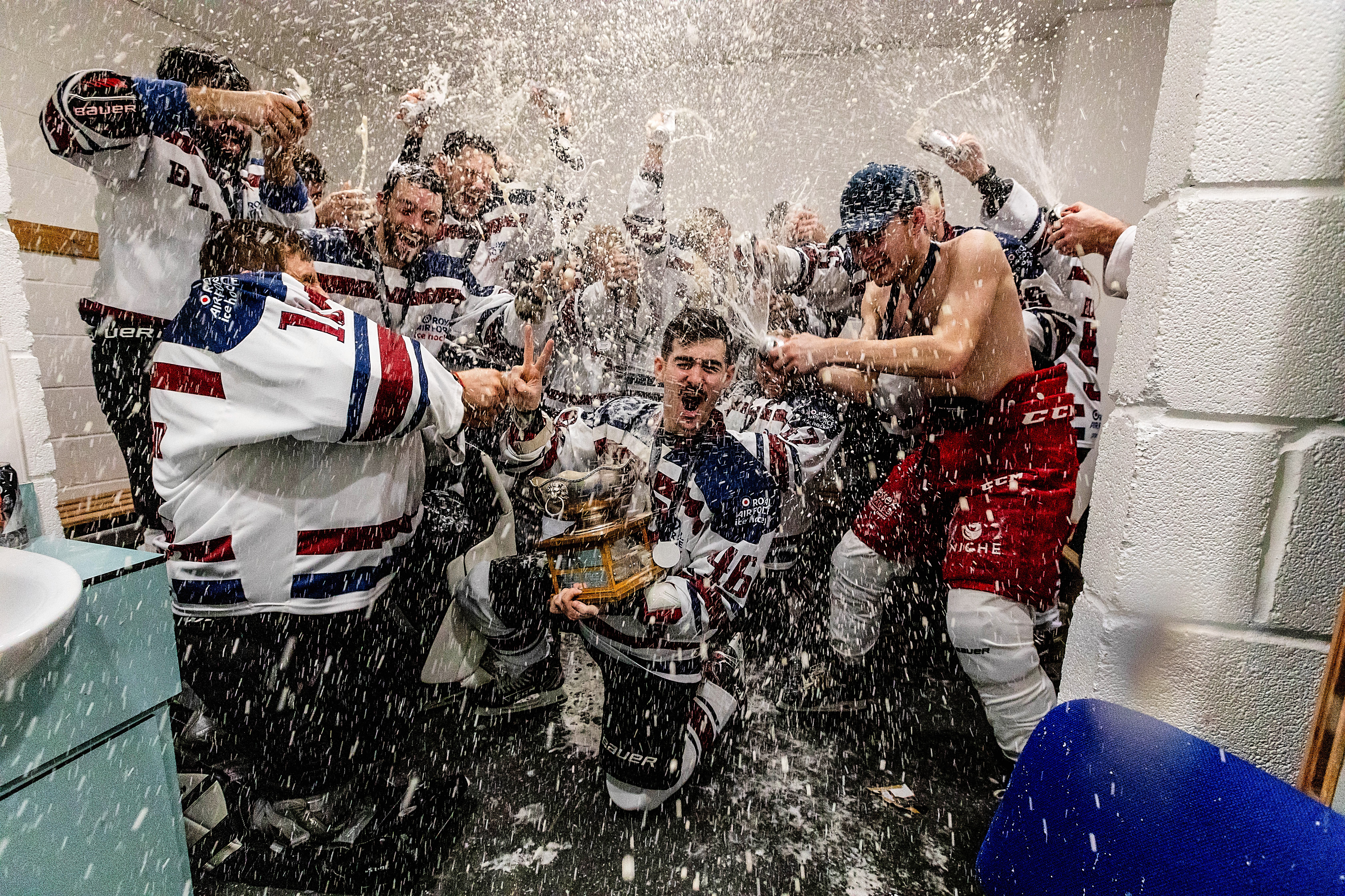 Celebrations in the locker room - photo credit: Trish Thompson Photography