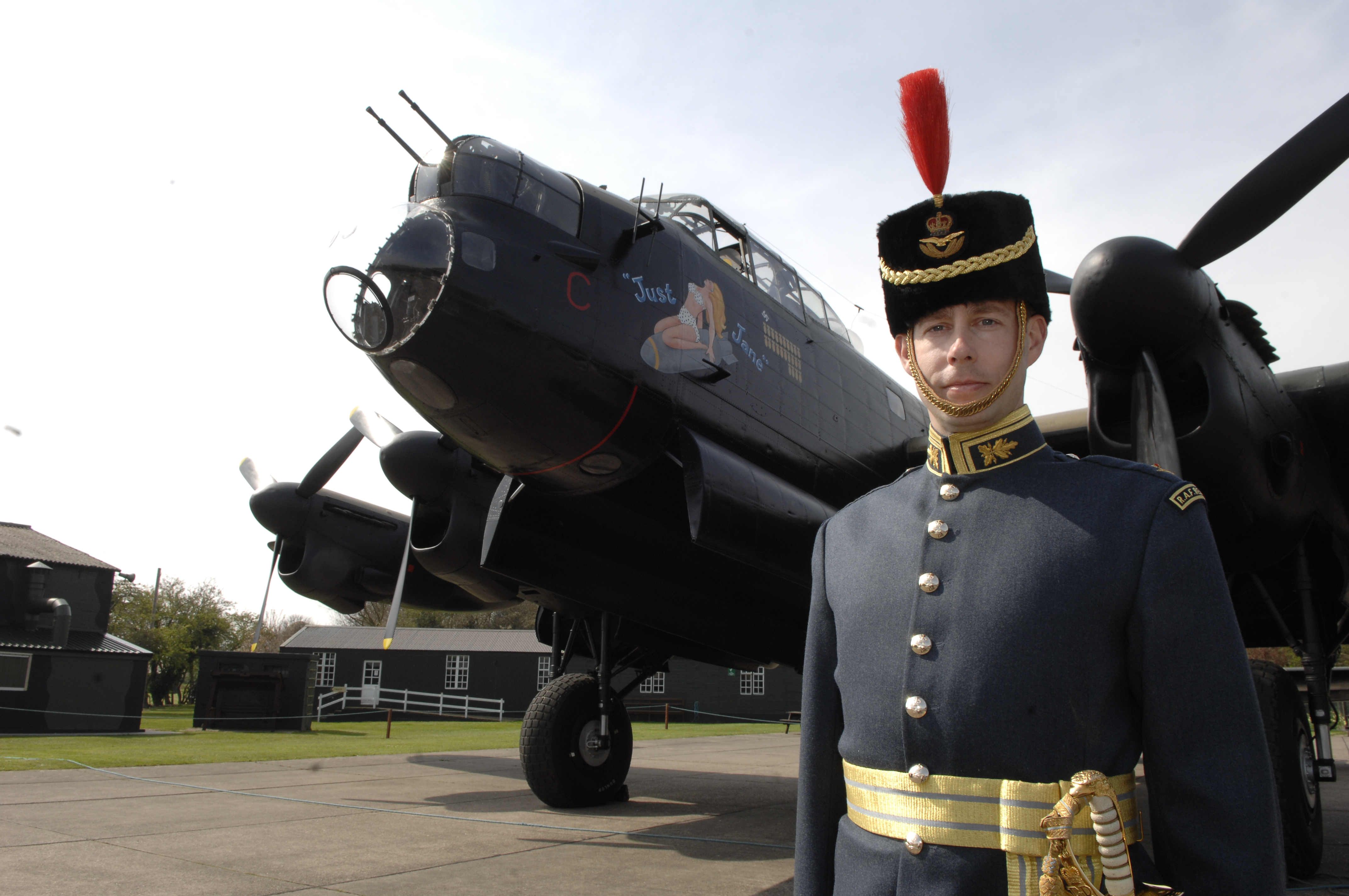 Flying Officer Piers Morrell with the Lancaster Bomber at East Kirkby.