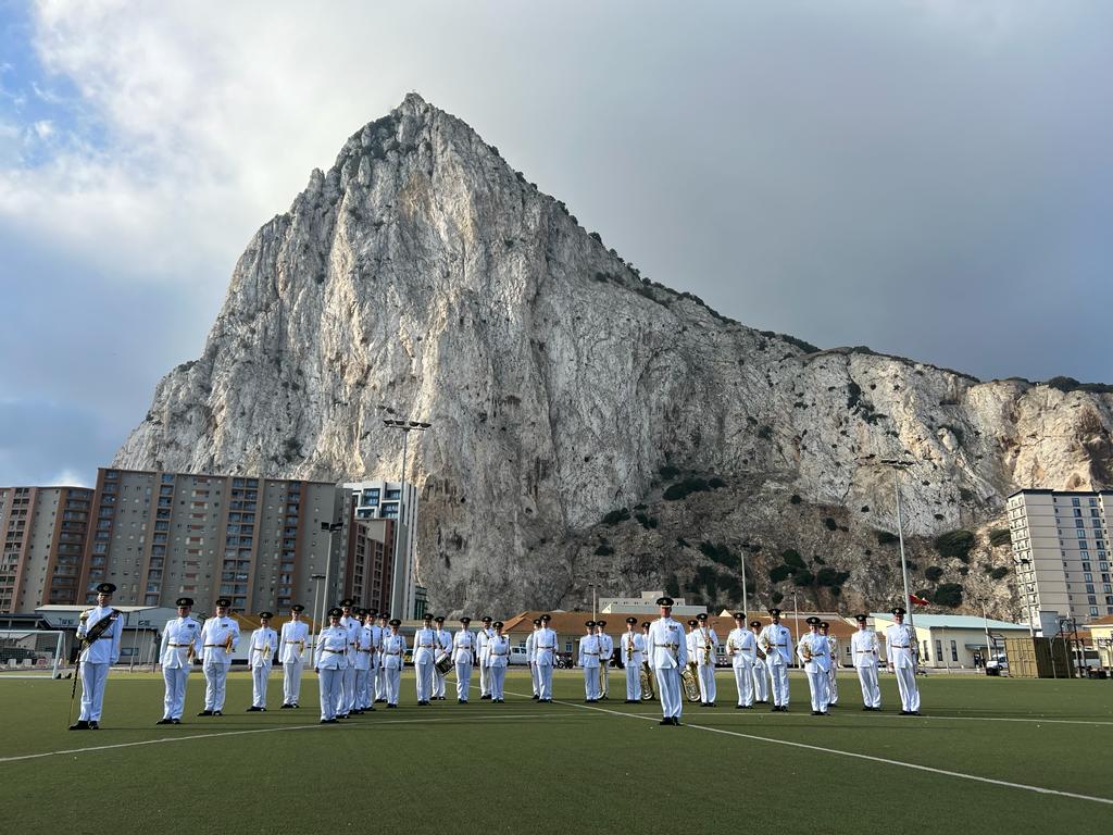 The Band of the RAF Regiment at Devil's Tower Camp with the North Face of Gibraltar Rock in the background.