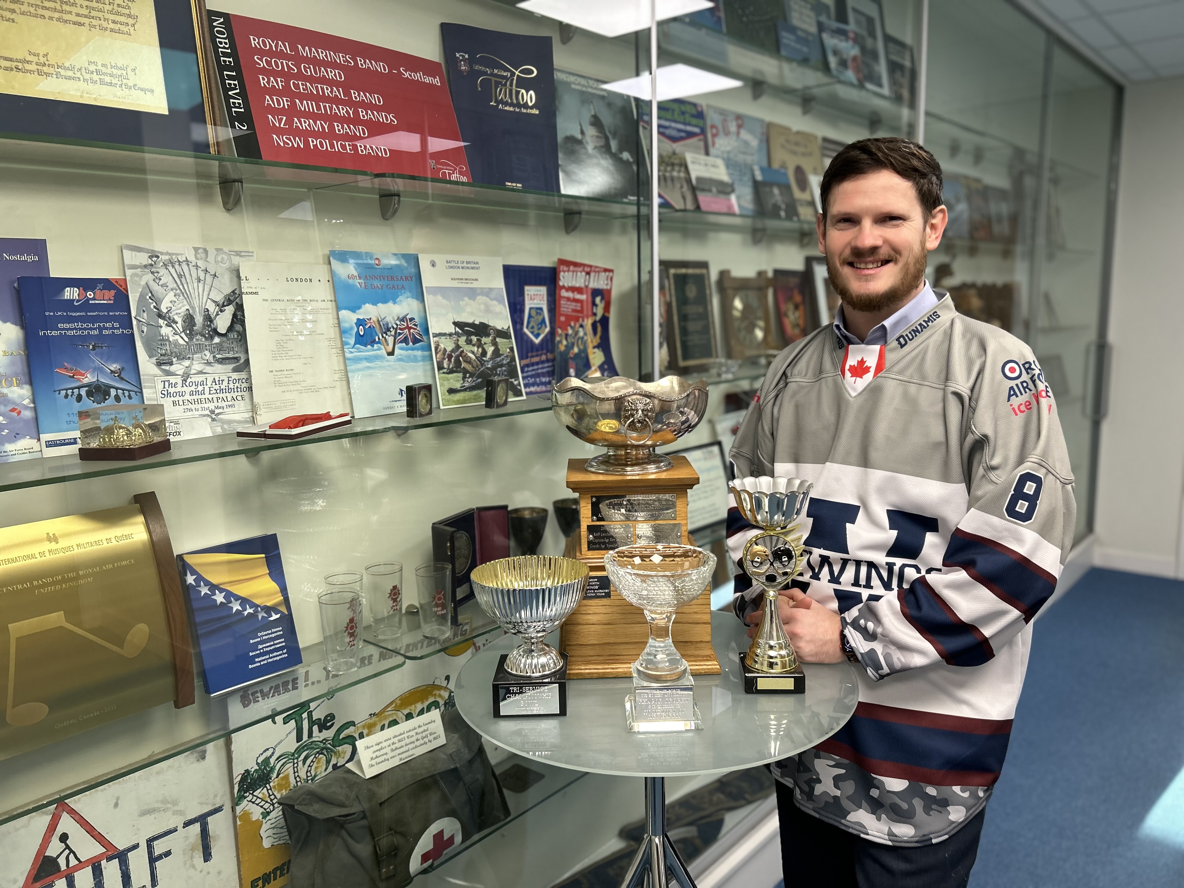 Cpl Young with his collection of trophies won at the RAF Ice Hockey Championships
