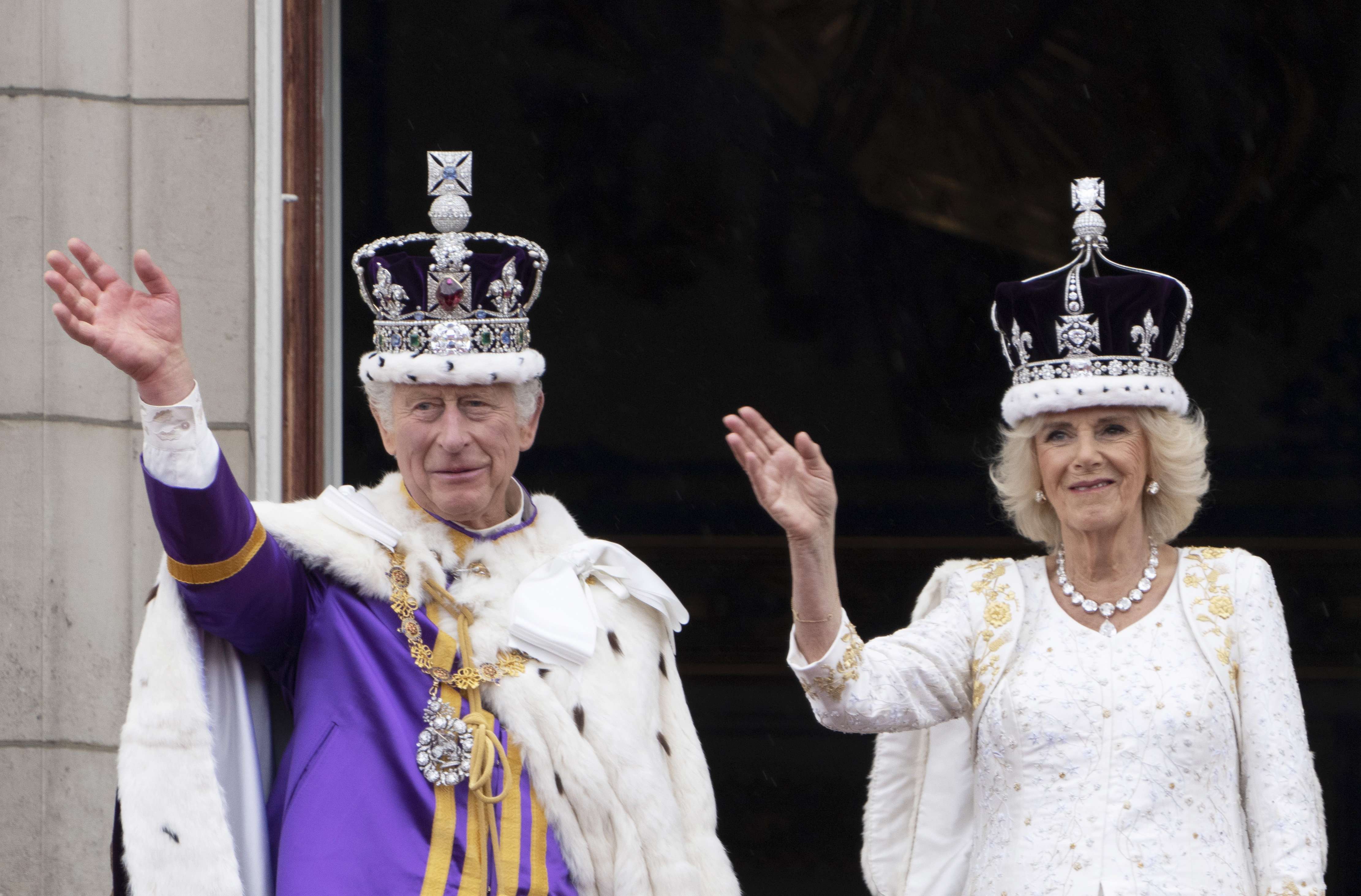 King Charles III and Queen Camilla on the balcony of Buckingham Palace shortly after the Coronation Service and Parade.