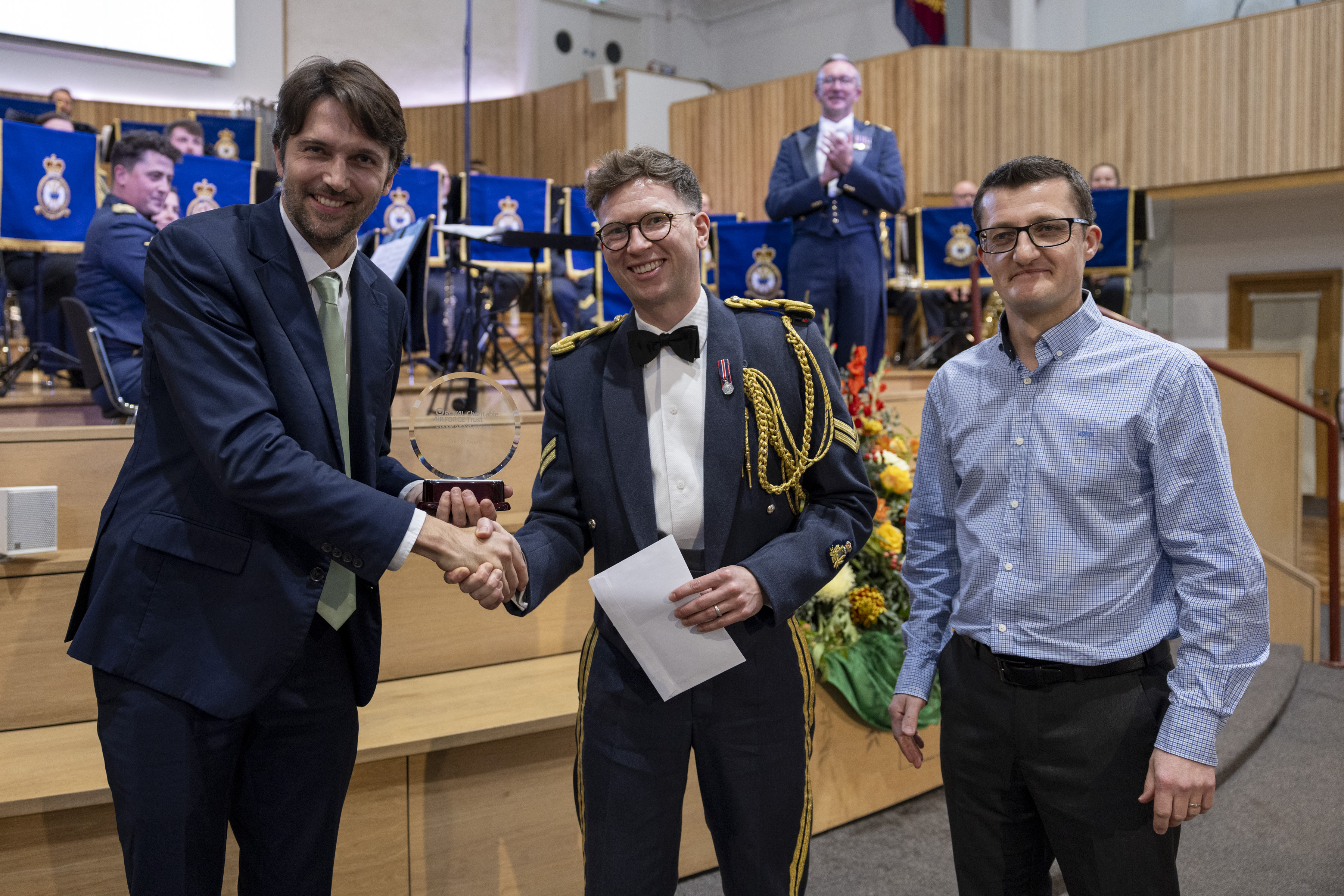 Congratulations Corporal Faull! Pictured here with adjudicators Thomas Hewitt Jones (L) and Dr Stuart Morley