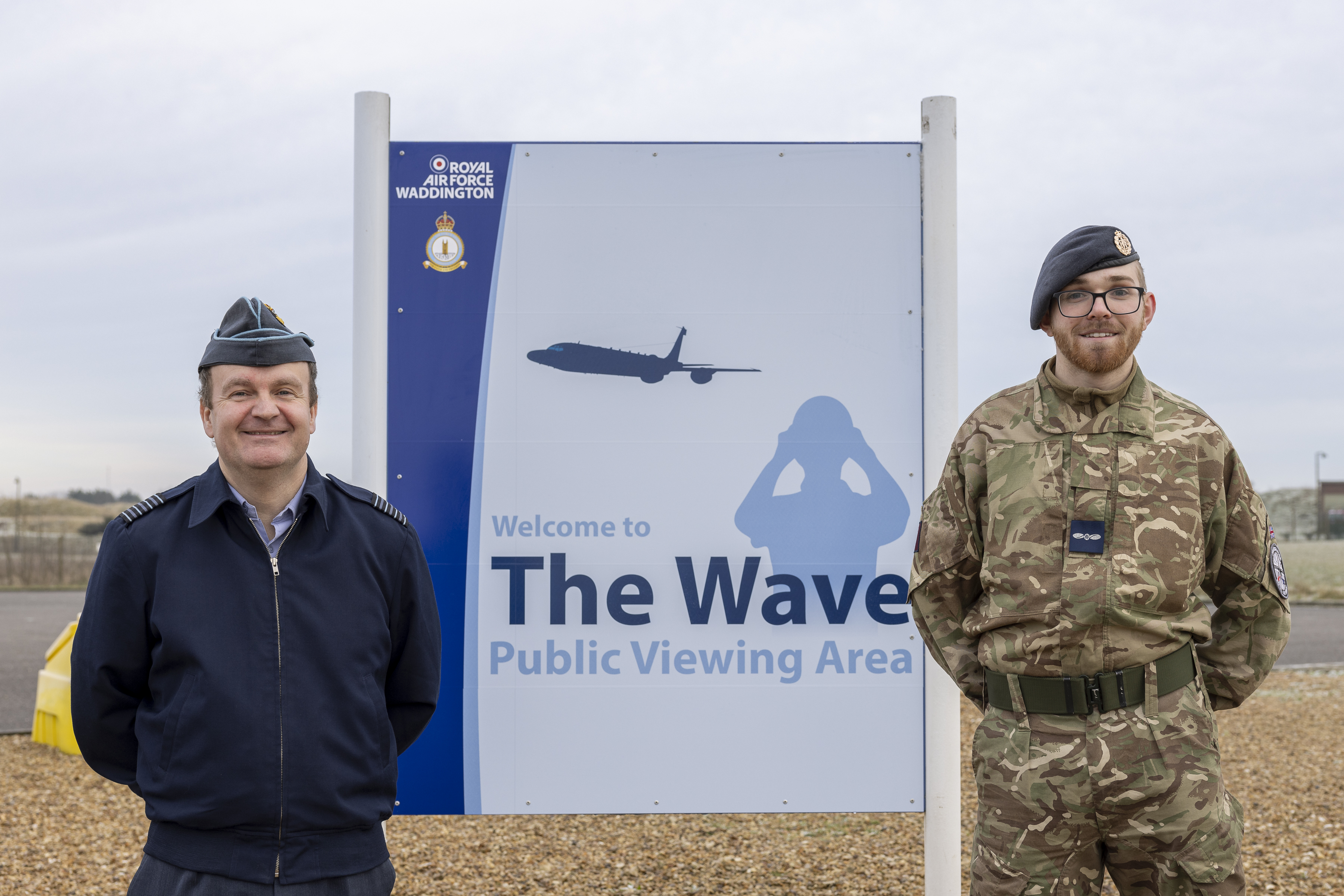 RAF Waddington Station Commander and RAF Visual Communicator, AS2 Webb,stood next to the new WAVE sign. 