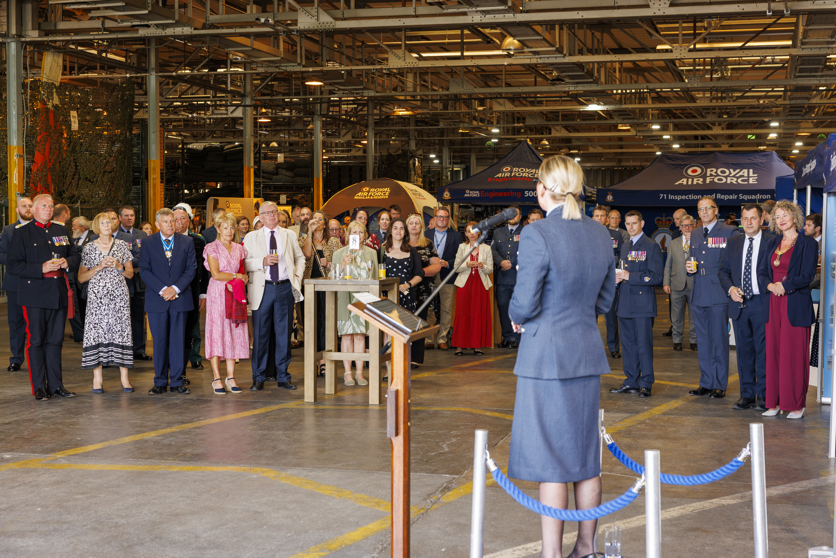 Station Commander Wing Commander Nikki Duncan welcomes guests at RAF Wittering's Annual Formal Reception.