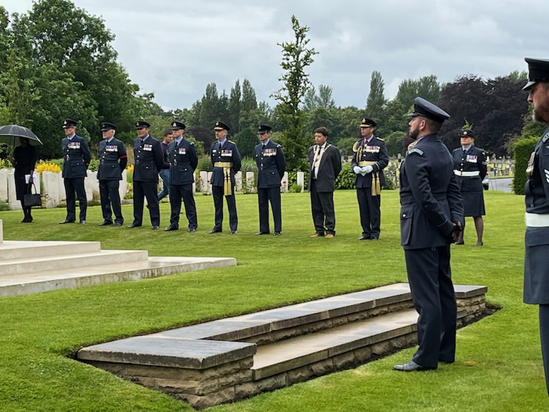 Military and civilians at the service.