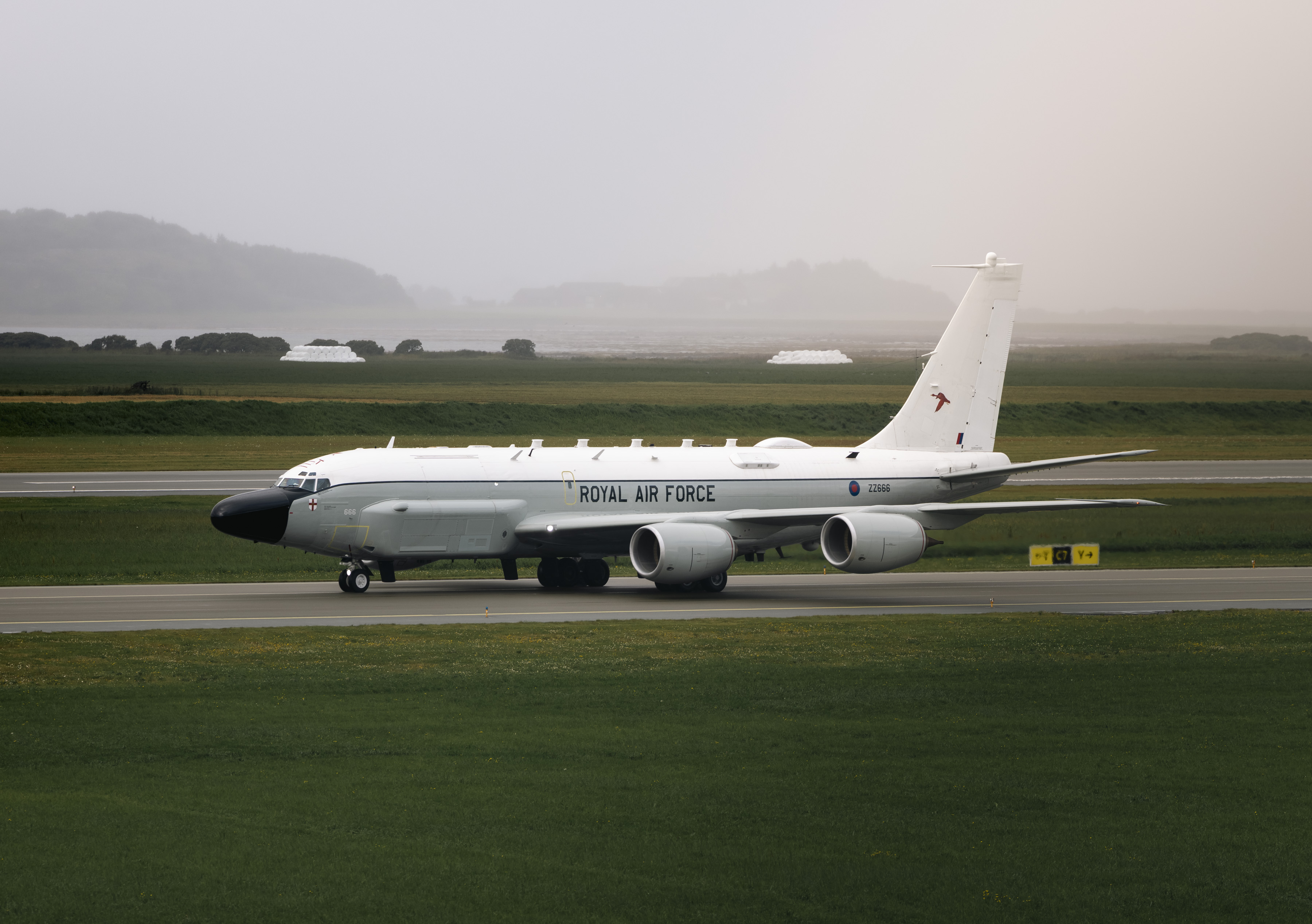 An RAF Rivet Joint taking off from the runway in Orland, Norway.