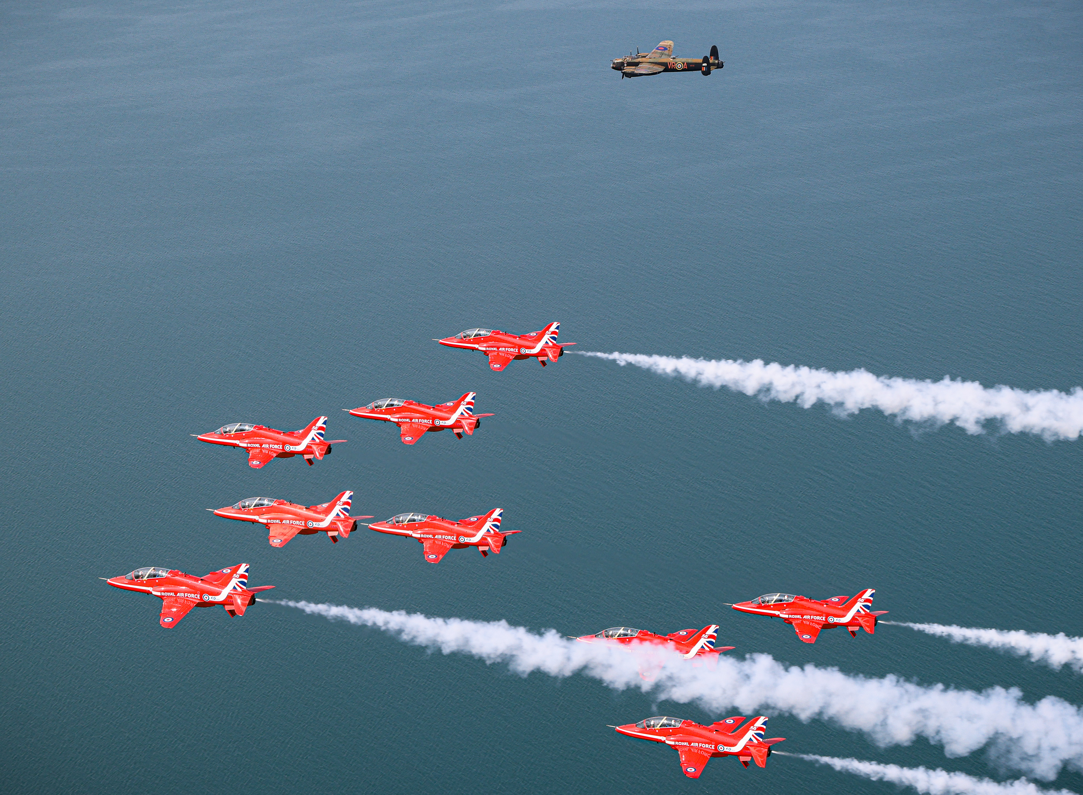The Red Arrows with a Lancaster heading to Niagara Falls - one of the high-profile flypasts of Maple Hawk.