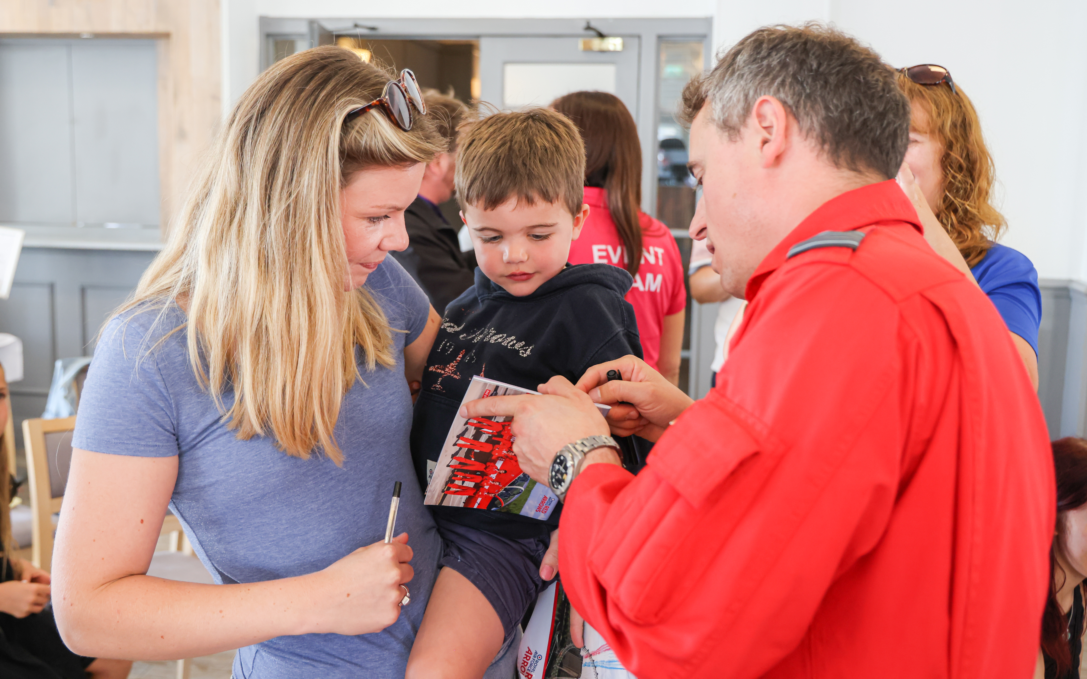 Red 6 meeting people at an airshow in 2023.