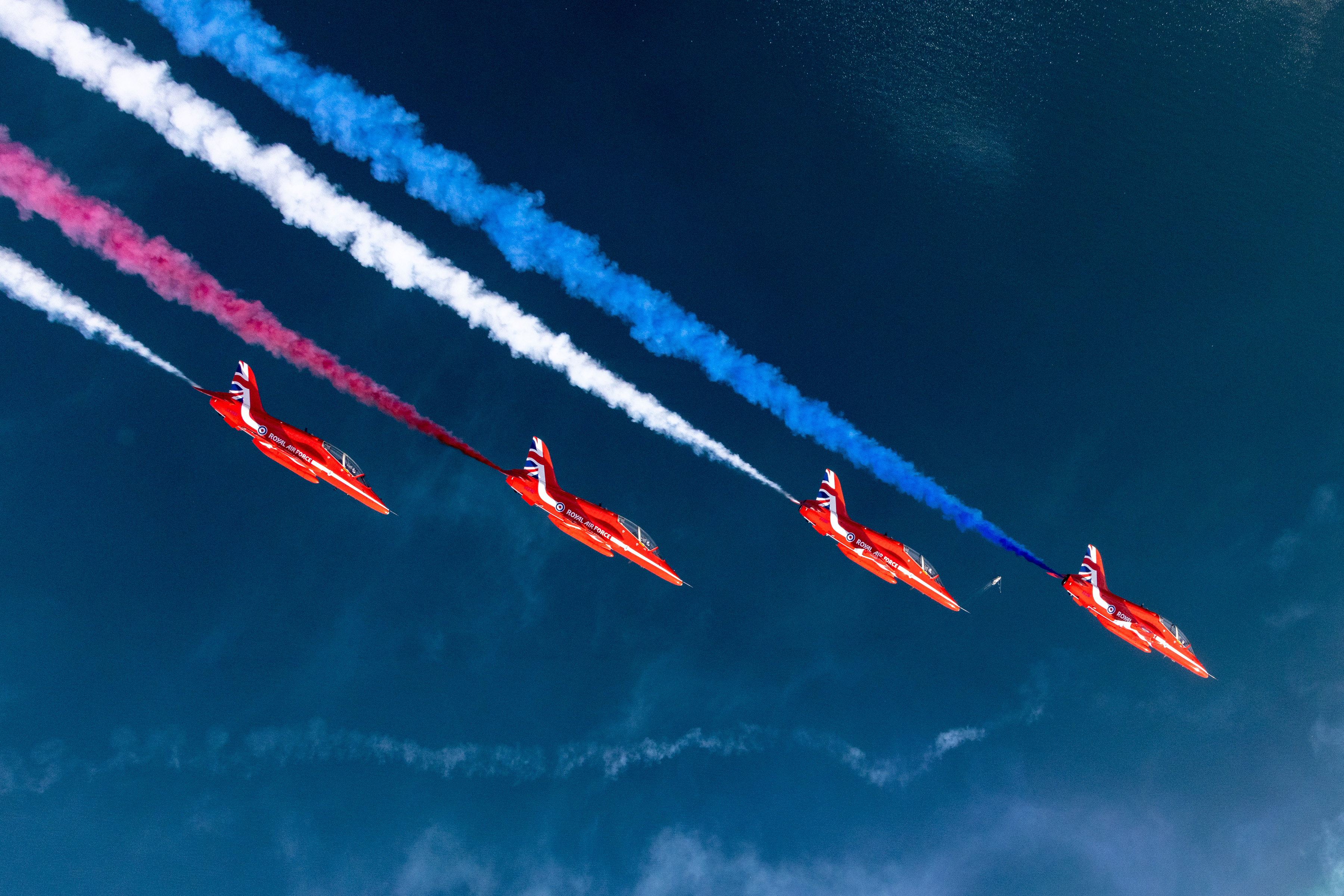 The Red Arrows fly four aircraft in Greek skies.