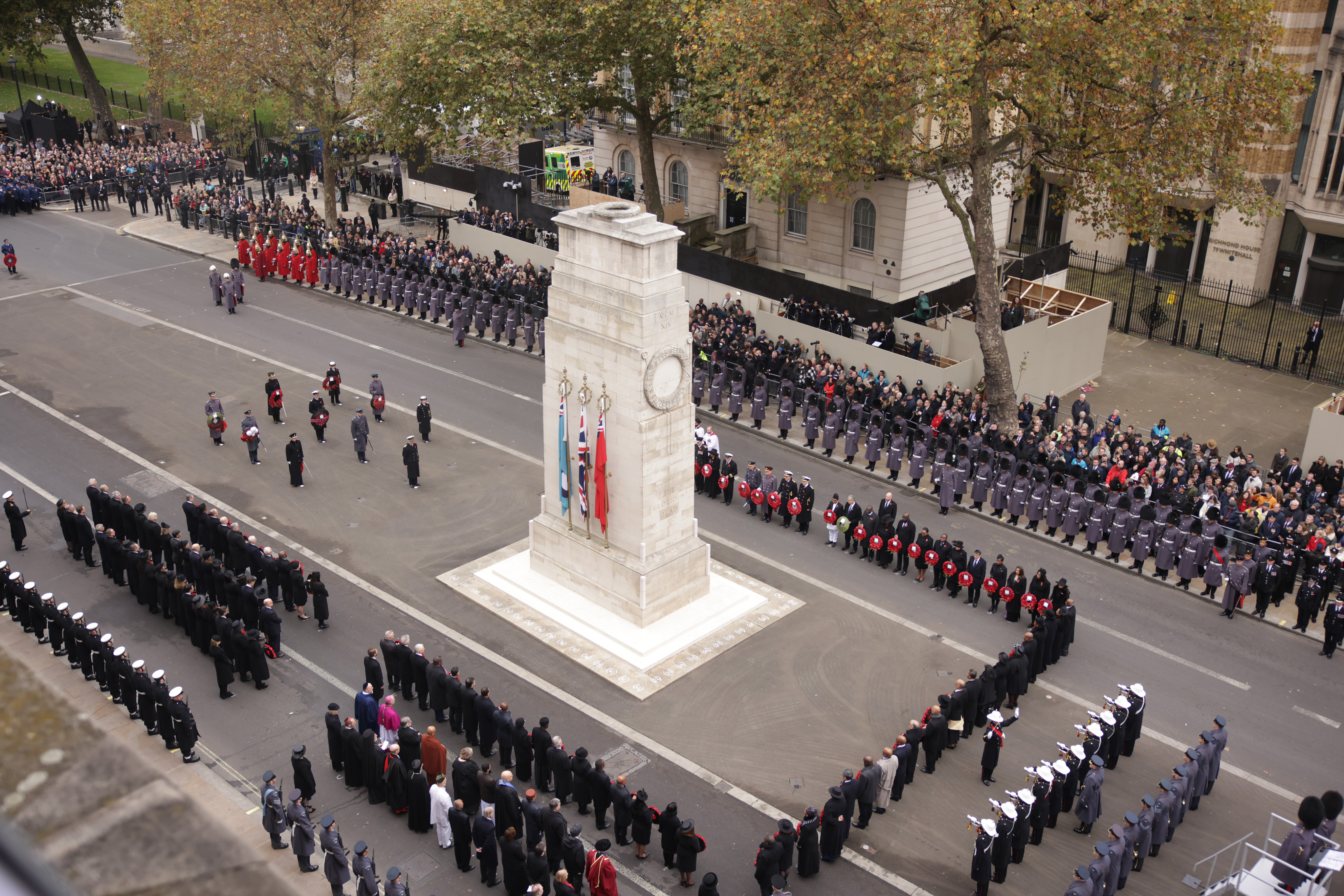 Military personnel, the Royal Family, and members of the public at the Cenotaph in London.