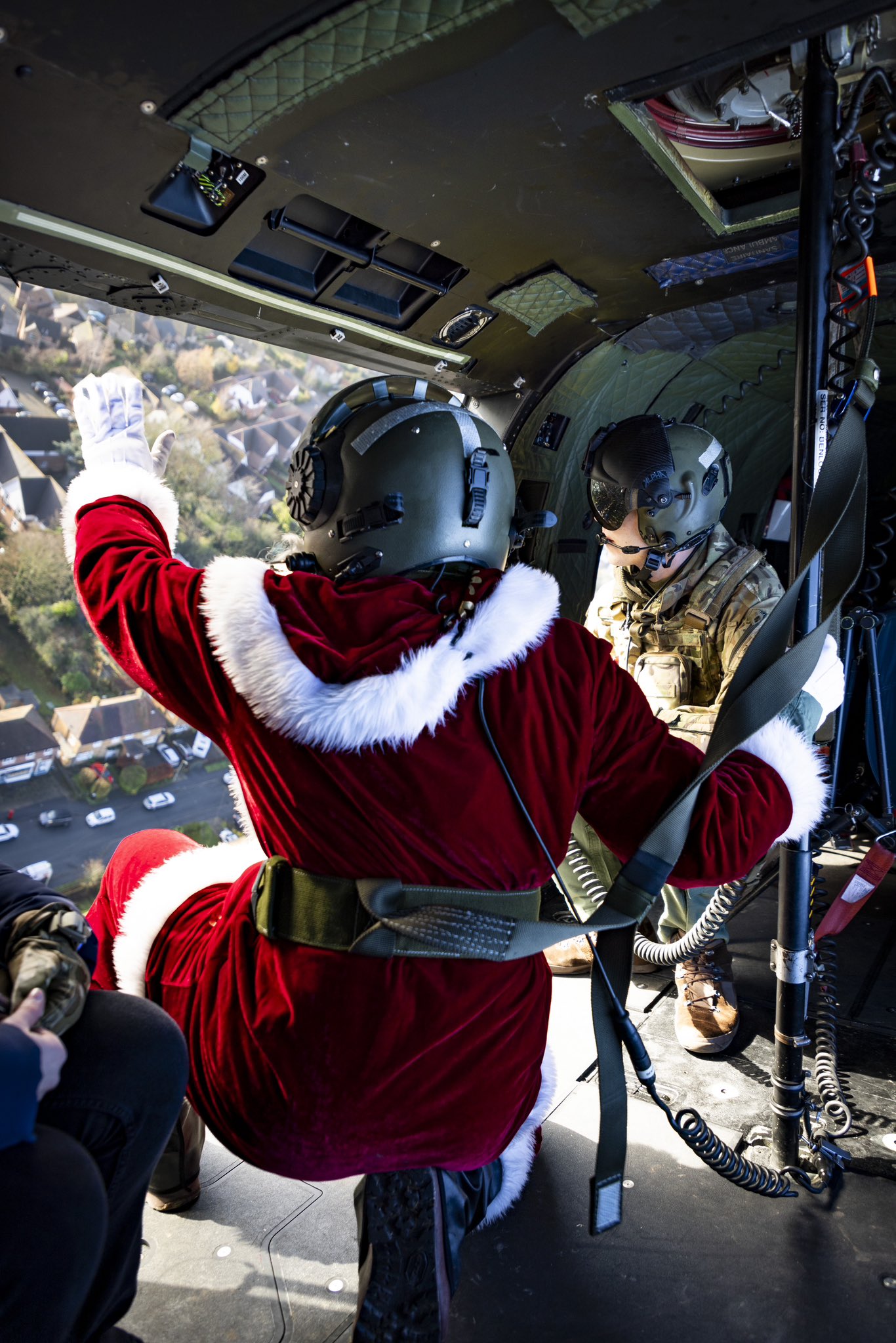 Santa waving out of the Puma helicopter