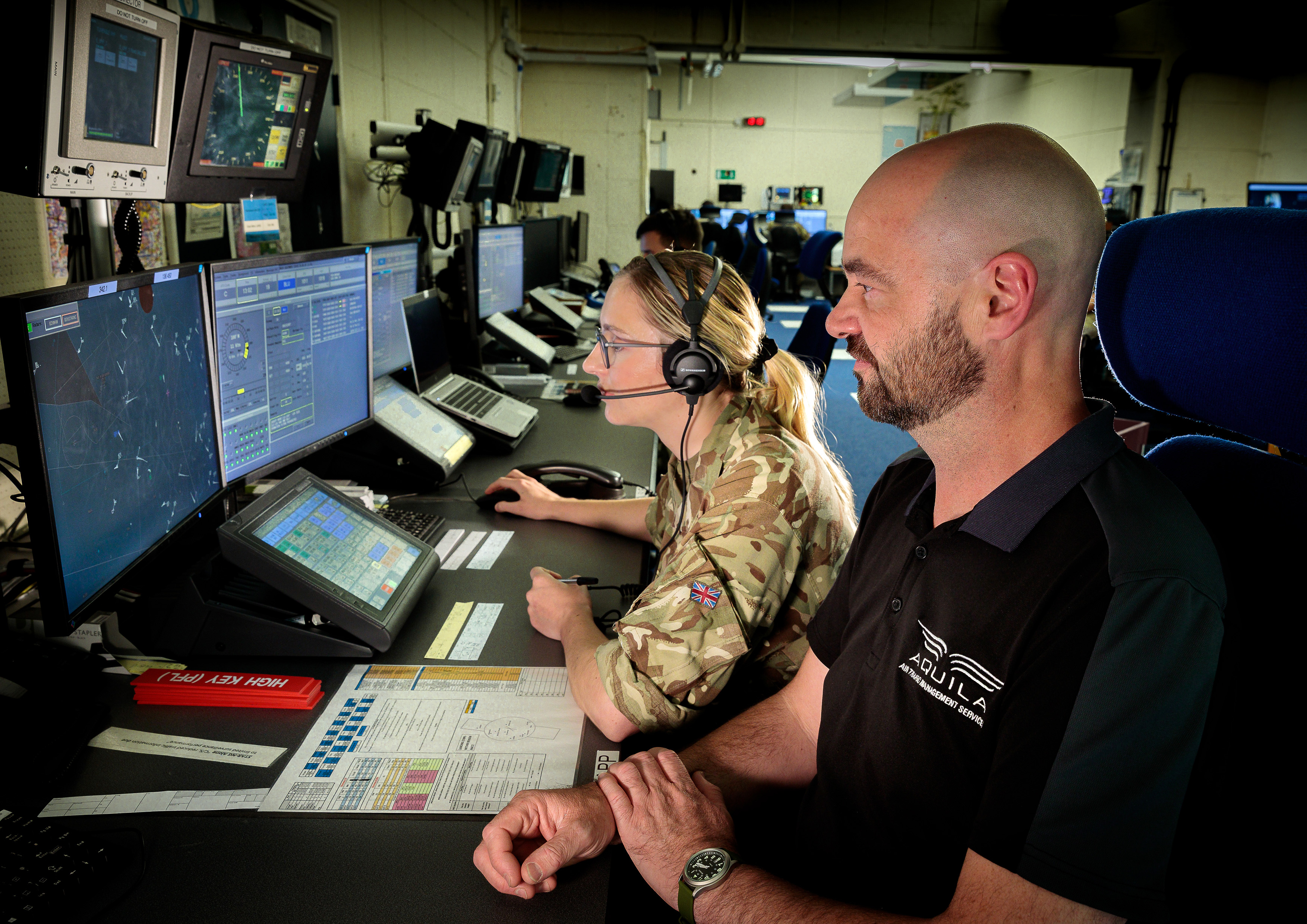 Air Traffic Controller using the new tech with a contractor from Aquila.  Photo RAF