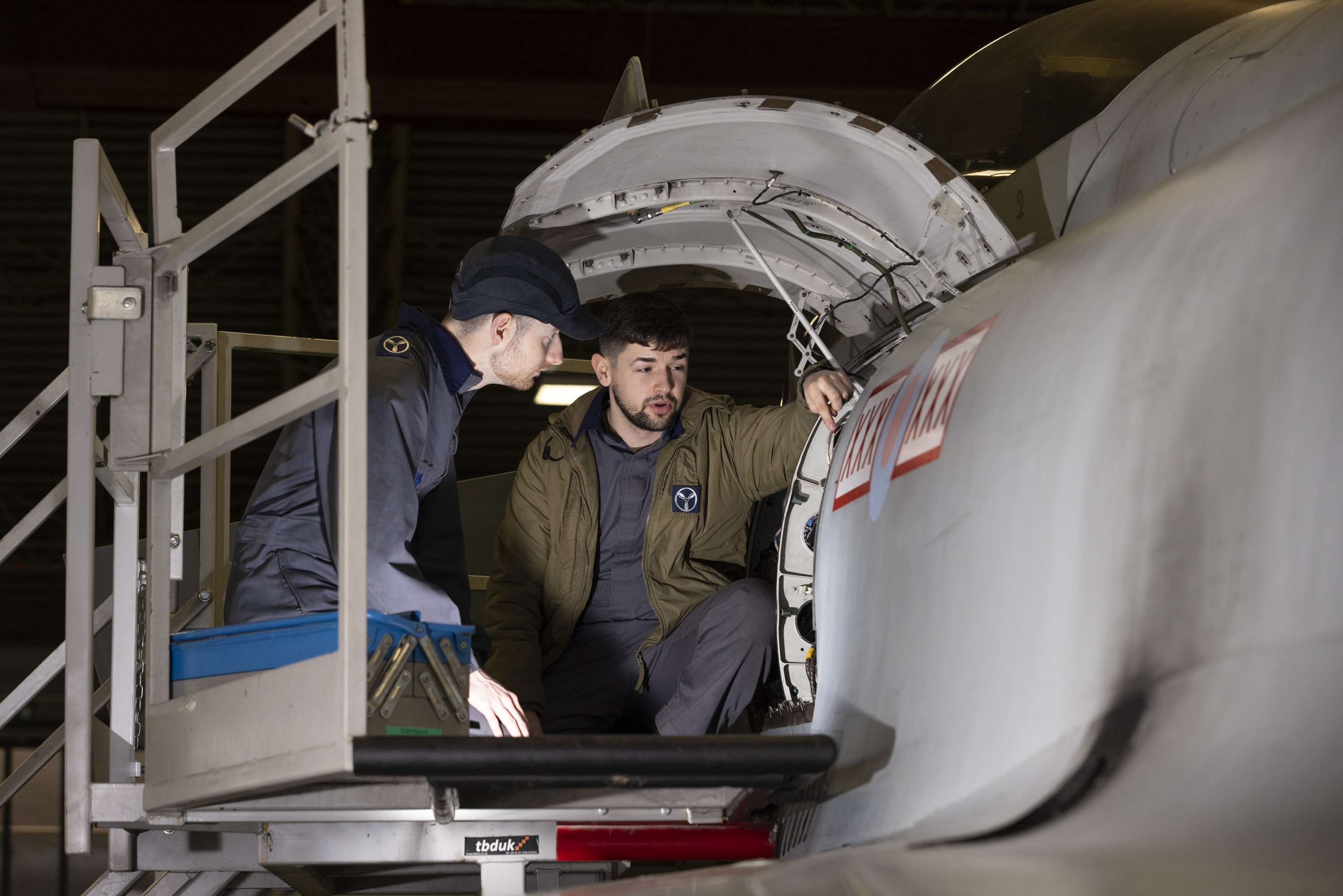 Engineers tend to Typhoon wheel.