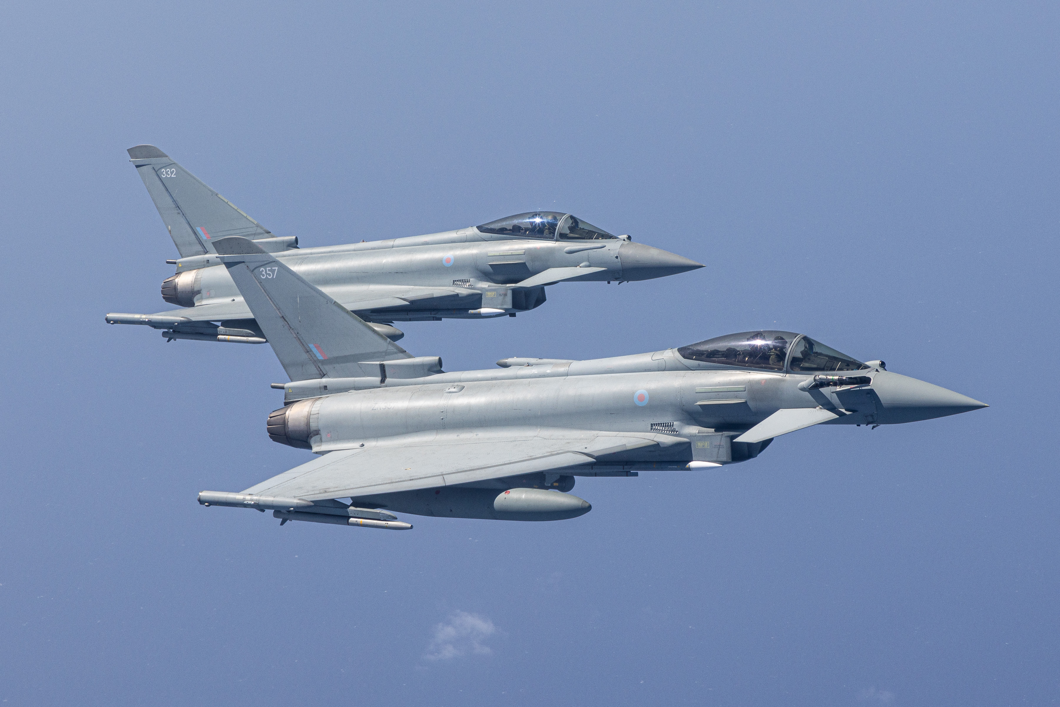 Two RAF Typhoons flying in formation.