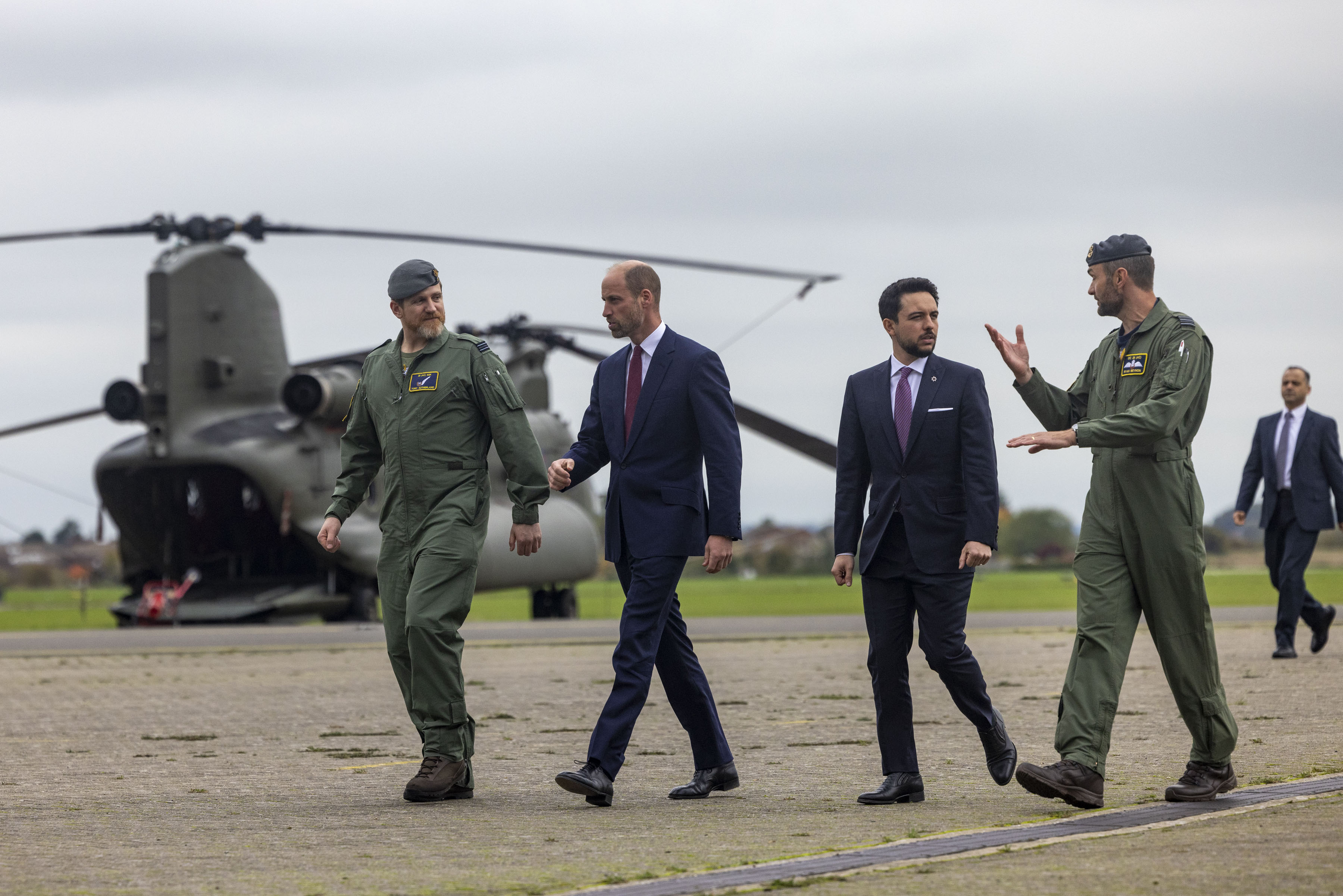 The princes walk together talking to Aircrew.