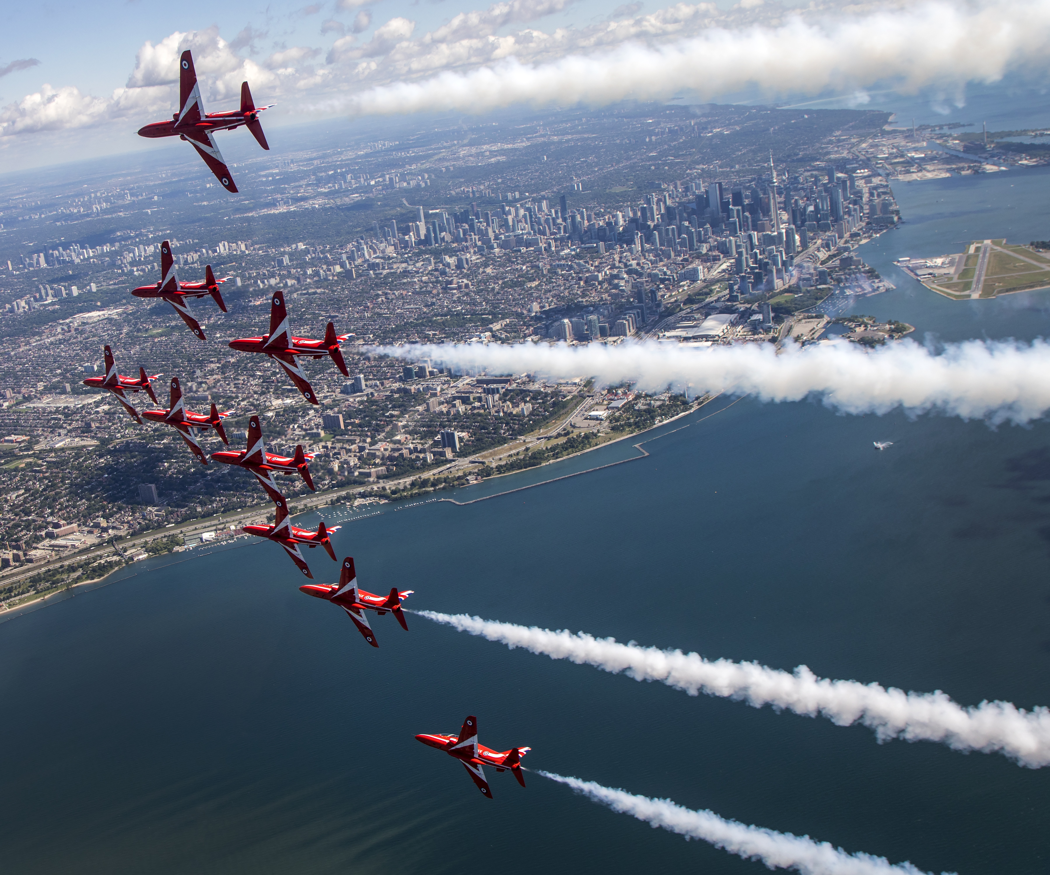 One of the roles of the Red Arrows - seen here above Toronto, Canada - is to support a range of UK interests overseas. 