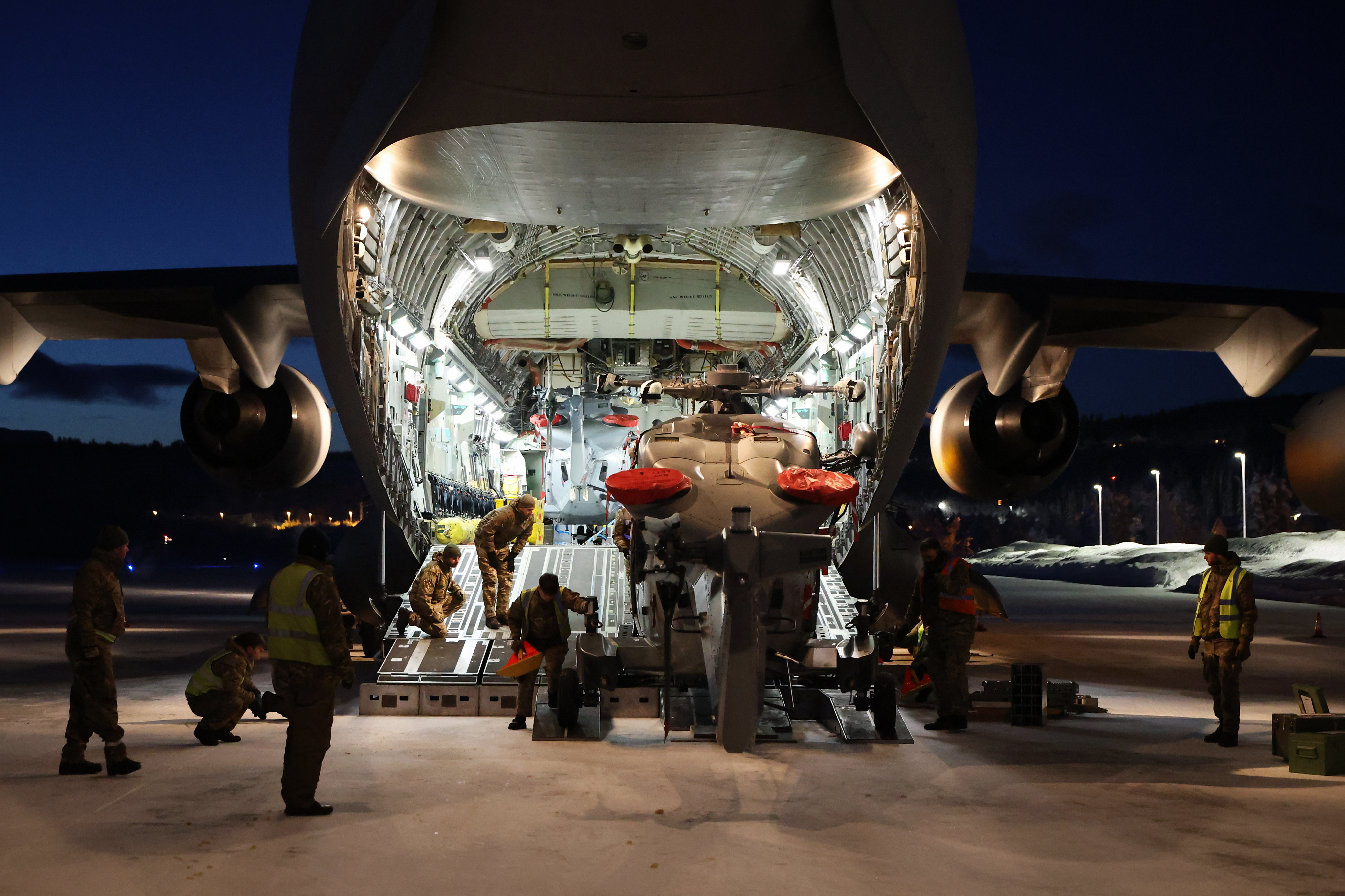 Large cargo plane being loaded